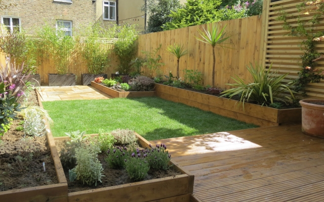 Raised Flowerbeds and Deck Designed by Gardenia Gardens of Dulwich